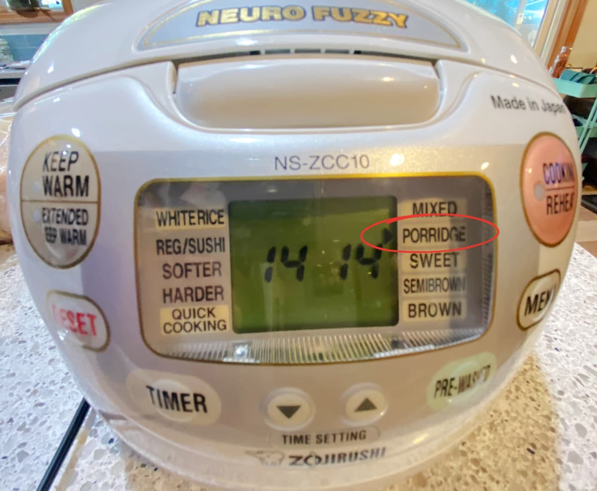 Front of a rice cooker showing settings, with "Porridge" setting circled.