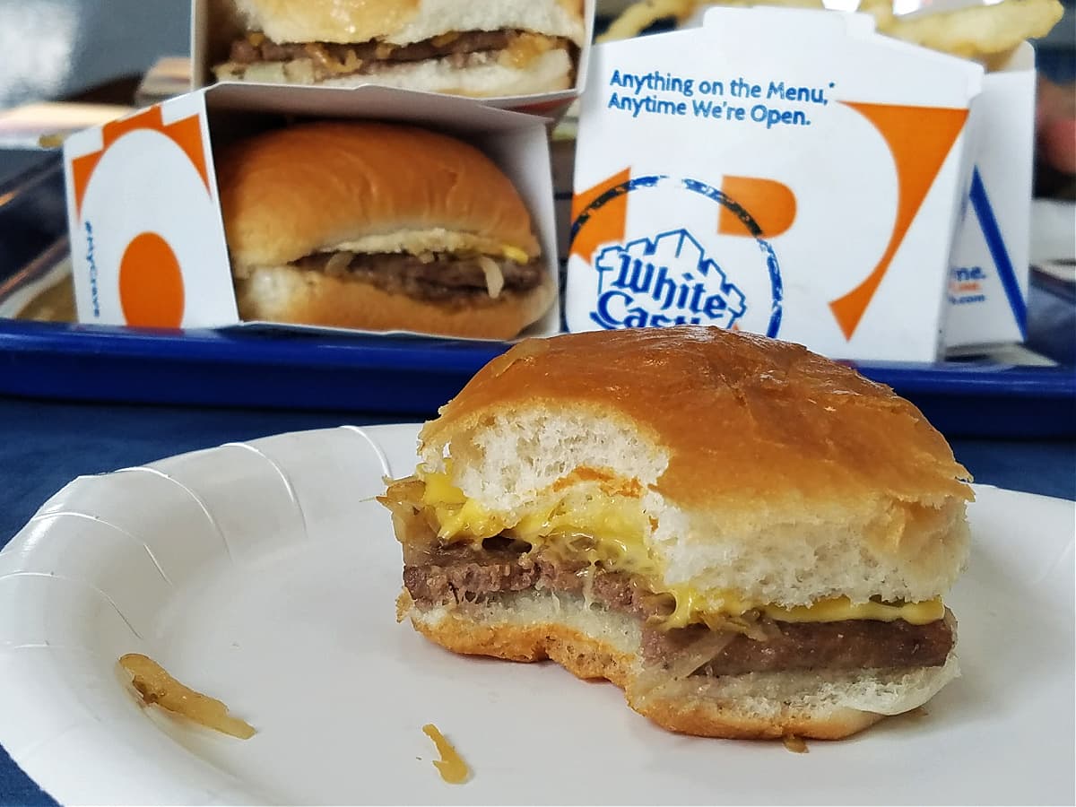 White Castle cheese slider, with one bite taken. 