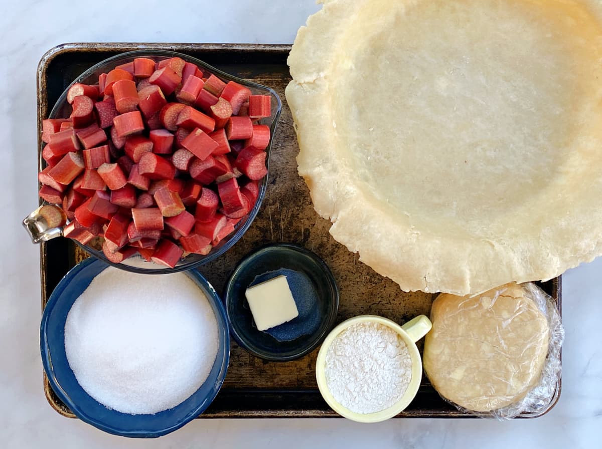Photo of individual ingredients that go into this Rhubarb Pie recipe, measured and prepped.