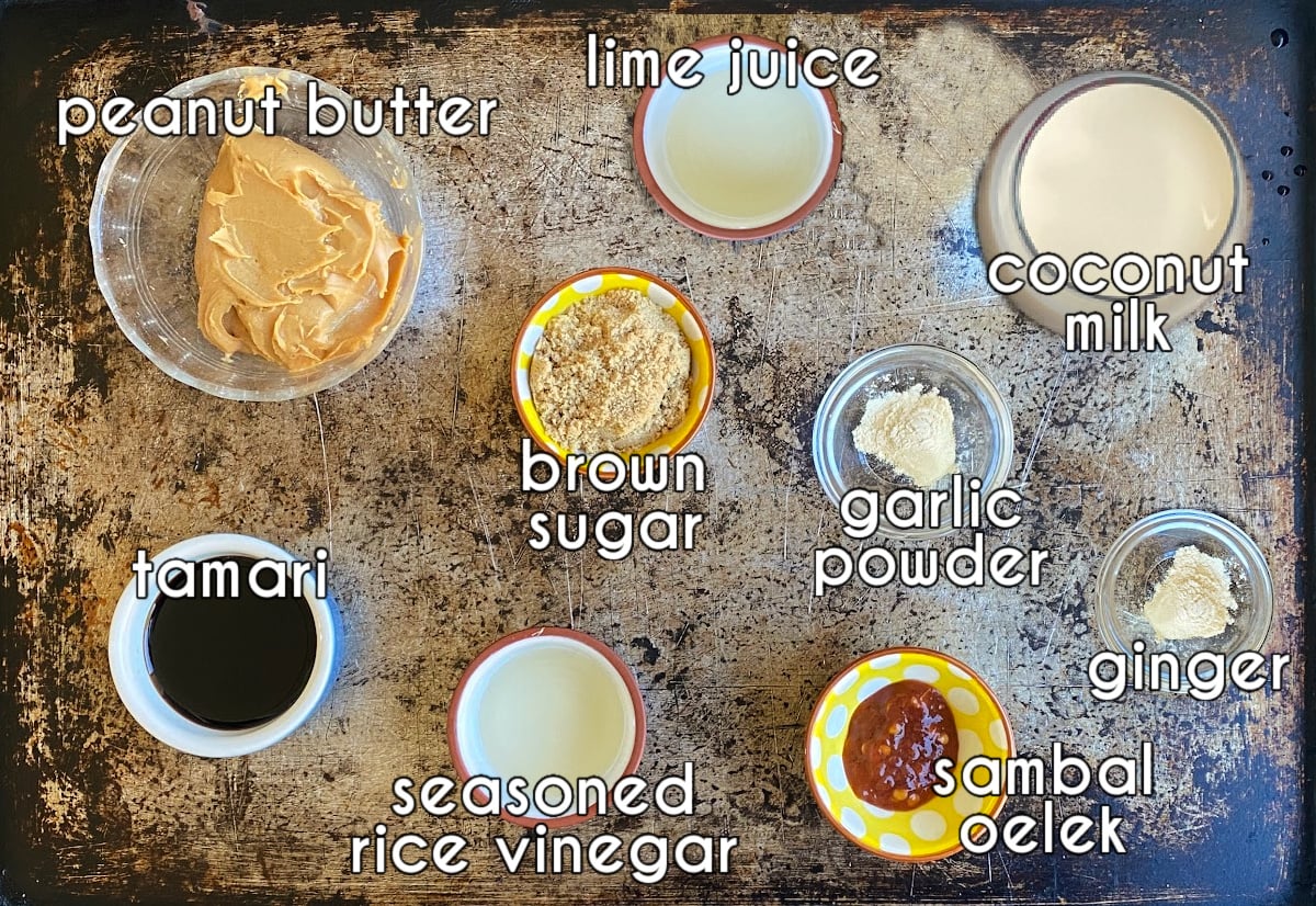 Photo of individual ingredients that go into this easy peanut sauce recipe, measured and prepped.