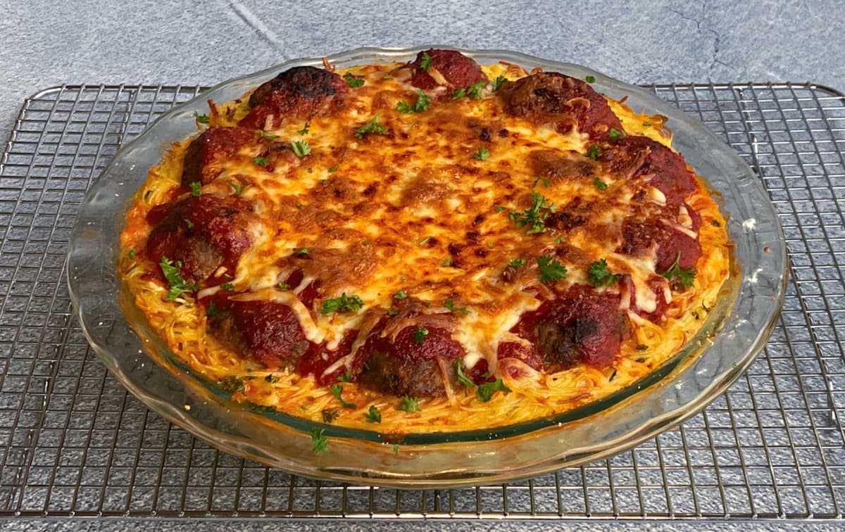 Spaghetti & Meatball pie, cooked and cooling on a wire rack.