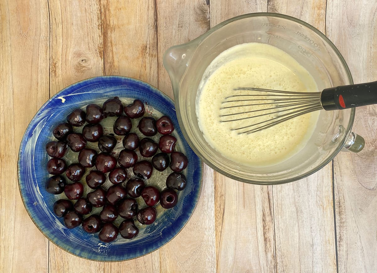 Cherries and batter, ready to pour into pie dish.