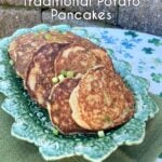 Irish boxty potato pancakes stacked on a plate with crispy golden edges. Pin text overlay reads Irish Boxty, traditional Irish potato pancakes - A simple Irish Classic, perfect for St Patrick's Day.