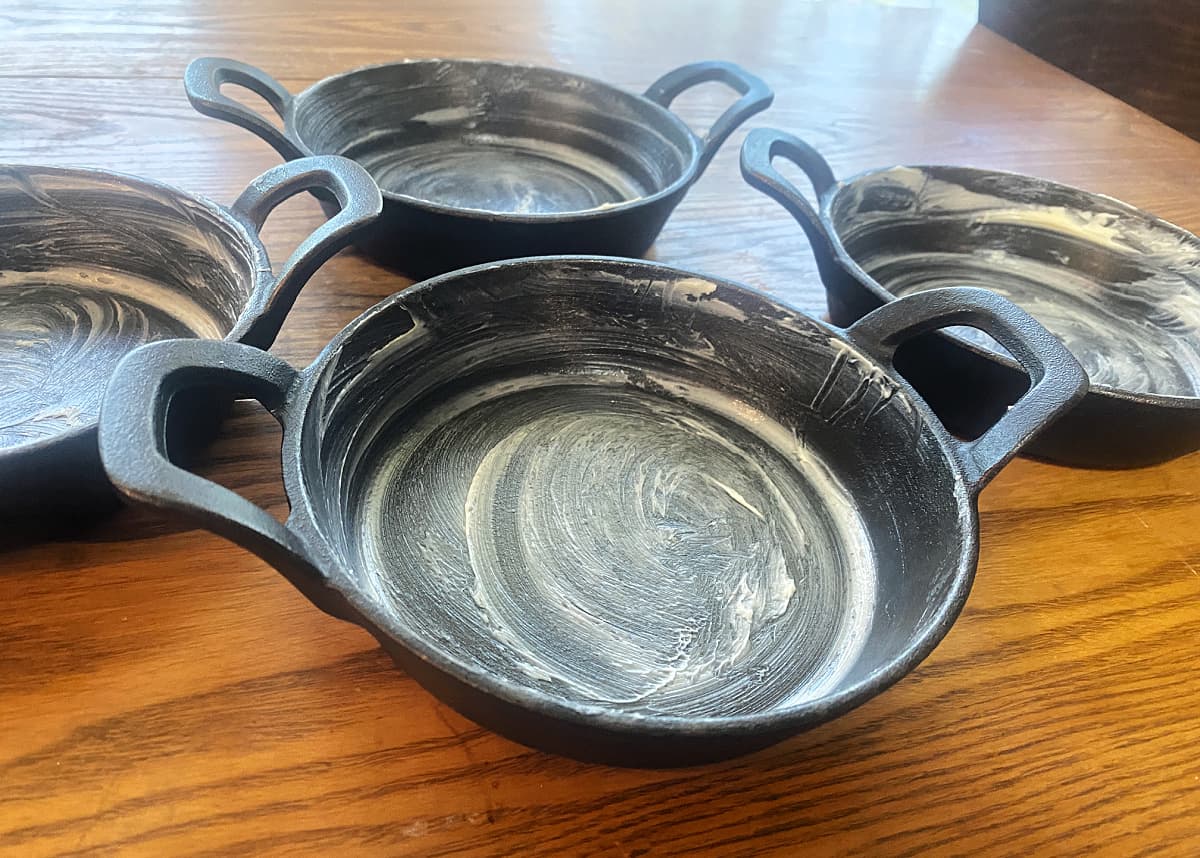 Mini skillets generously buttered. 
